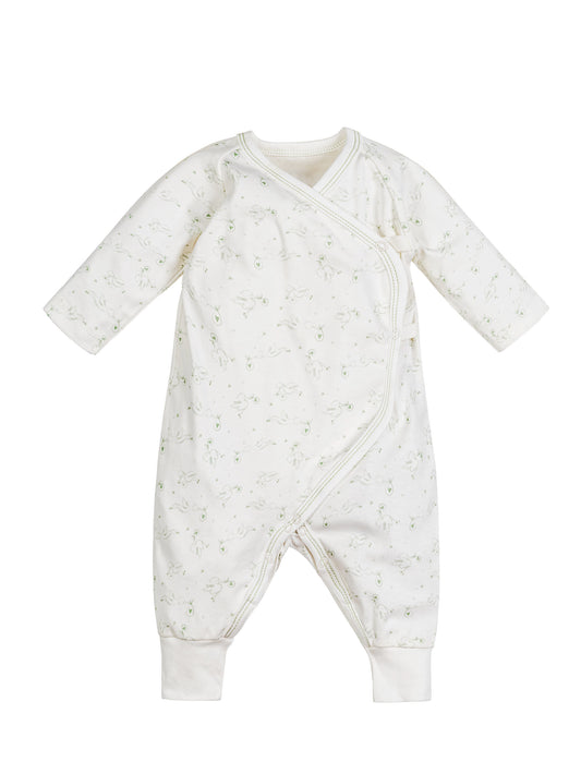 Mono de bebé estilo kimono con broches laterales y estampado de cigüeñas, confeccionado en algodón egipcio 100% orgánico.